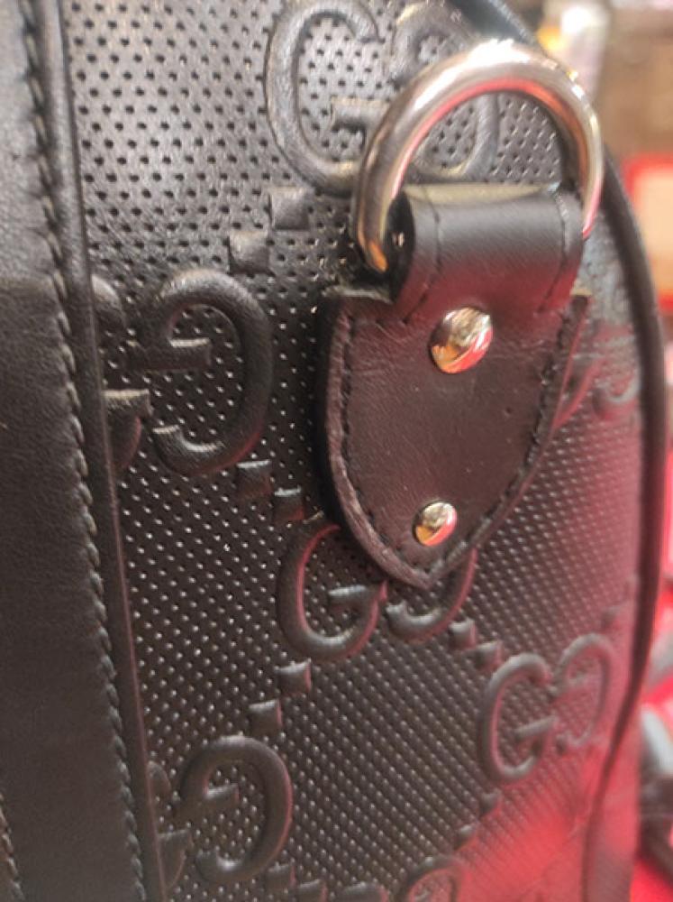 Réparation attache sangle sac Gucci après